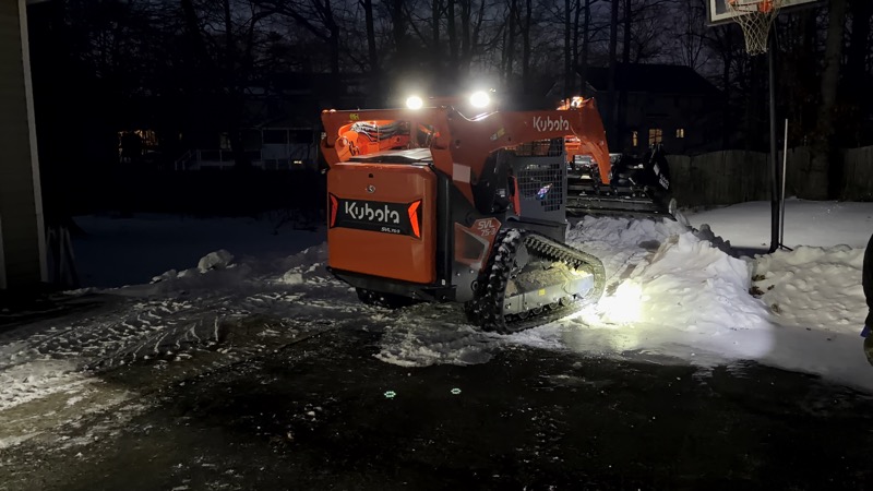 Kubota SVL75-2 compact track loader with lights on ready for work in Fredericksburg VA